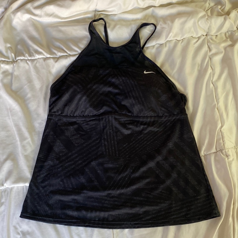 Women’s Nike swimwear top. Size: XL. Only wore handful of times.